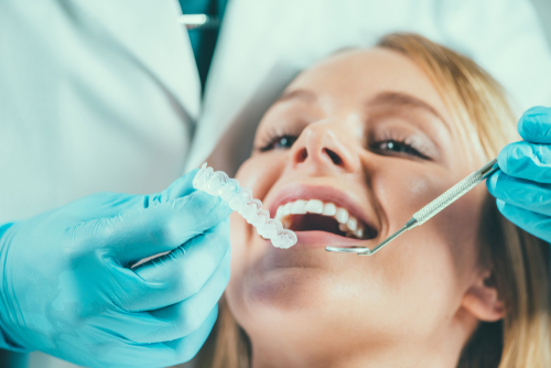 Women receiving cosmetic dentistry services in D.C.
